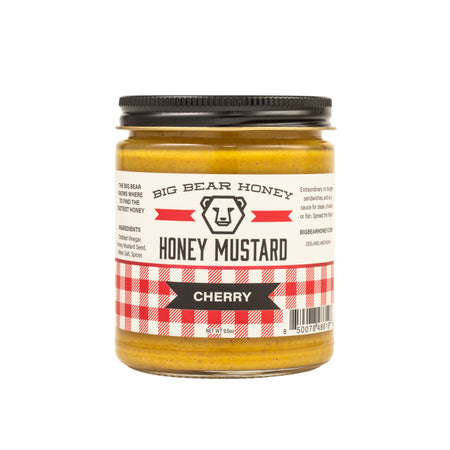 Jar of Big Bear Honey Cherry Honey Mustard on a white background