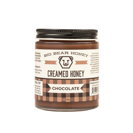 Jar of Big Bear Honey Creamed Honey Chocolate on a white background