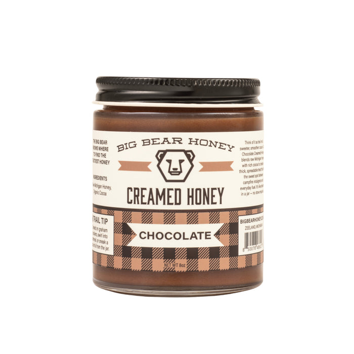 Jar of Big Bear Honey Creamed Honey Chocolate on a white background