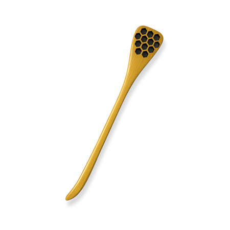Wooden spoon with honeycomb design on a white background