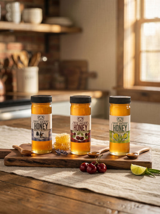 Three jars of honey on a wooden cutting board with kitchen background