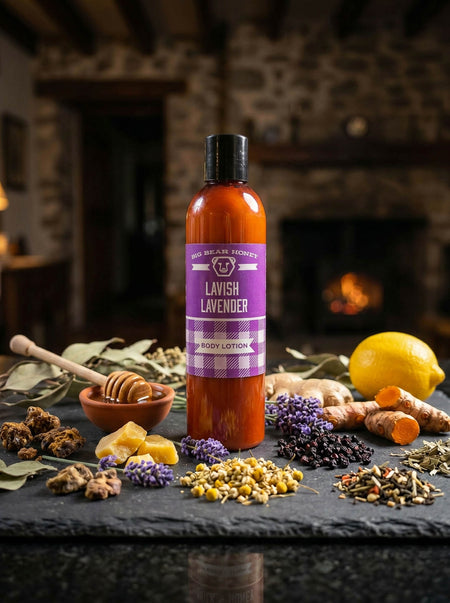 Body lotion bottle labeled 'Lavish Lavender' on a table with herbs and a fireplace in the background