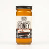 Jar of Big Bear Rum Infused Honey on a white background