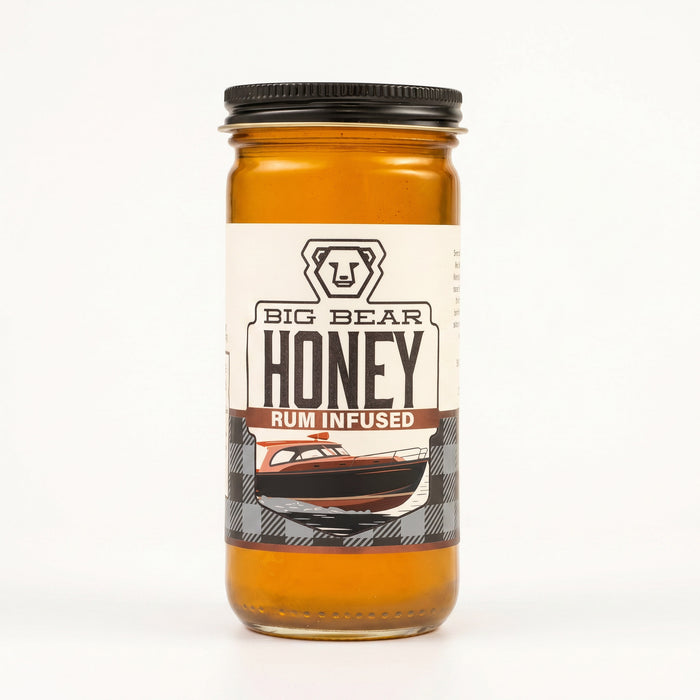 Jar of Big Bear Rum Infused Honey on a white background