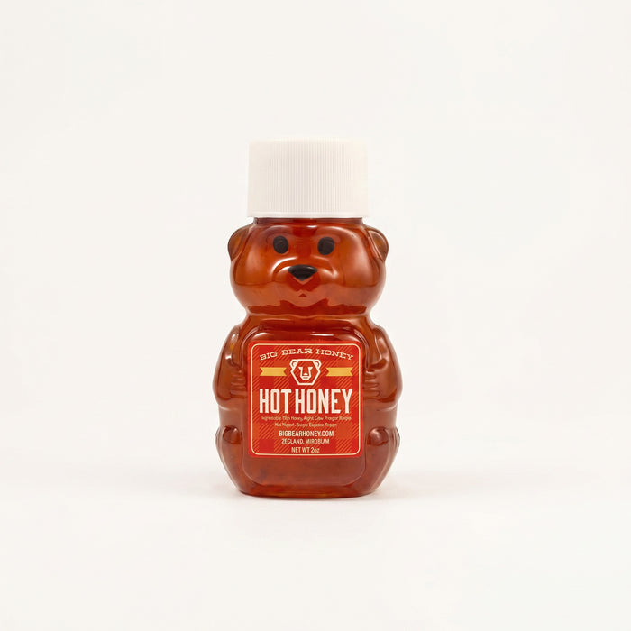 Honey bear container with 'Hot Honey' label on a white background